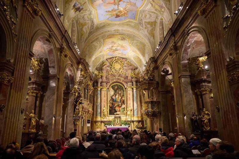 String quartet performing in front of the altar at Capuchin Church Vienna