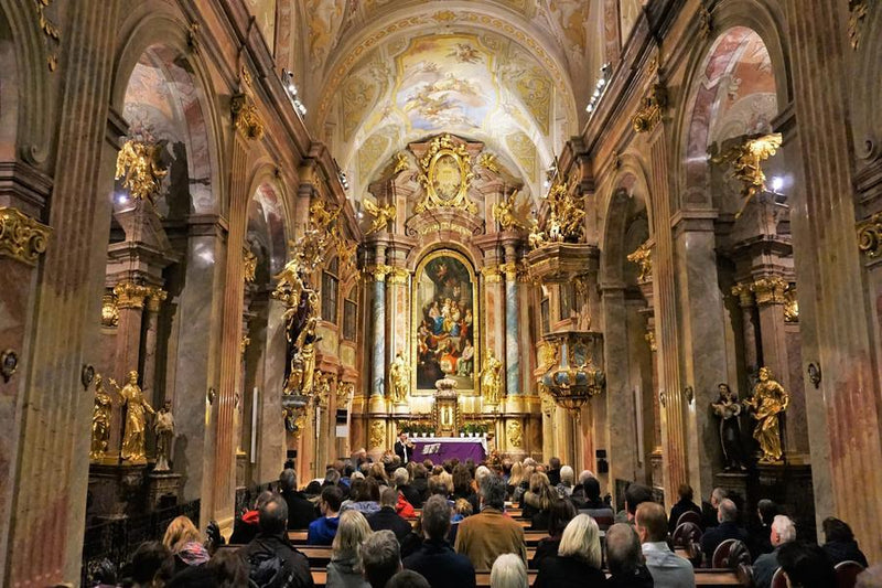 Trumpet concert at St. Anne's Church during Advent with audience seated in the nave.